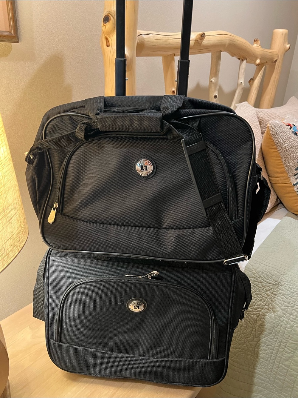 Classic Black Rolling Travel Duffel Bag with Shoulder Strap